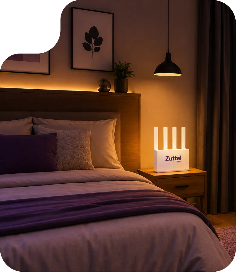 Roteador Zuttel sobre o criado-mudo de um quarto com luz baixa